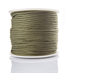 Green para cord over white background 