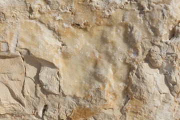 Texture - light yellow sandstone, structure of stone.