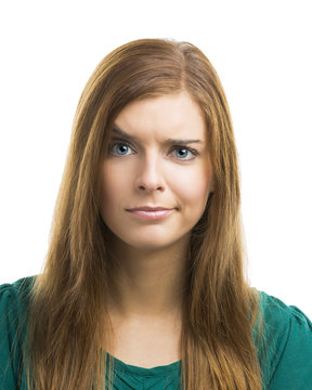 Young woman with a suspicious face