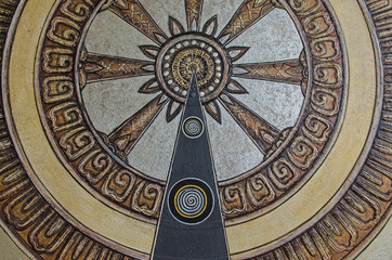 Circular wheel decorated wall art texture background