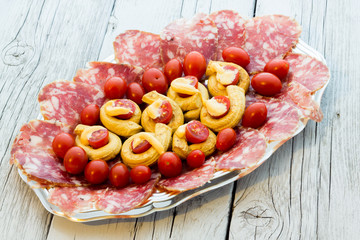 Taralli piccanti with tomato mayonnaise and salami