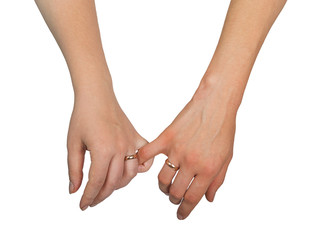 Two woman holding their hands