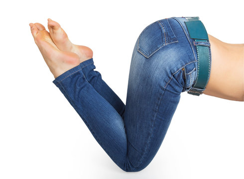 Close up of woman legs with jeans and barefoot