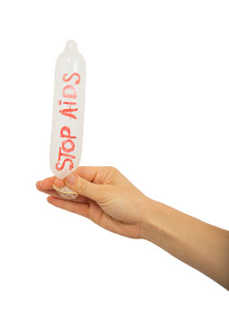Inflated condom in female hand
