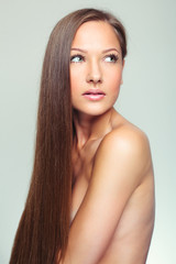 Naklejka premium Beautiful Woman with Healthy Long Hair