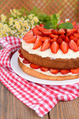 Delicious biscuit cake with strawberries