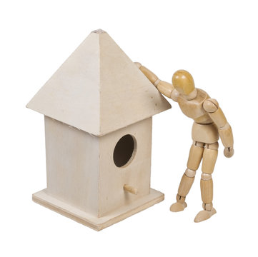 Peering into a Birdhouse with Roof and a Peg for a Porch