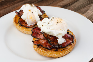 Benedict eggs with crispy bacon and hollandaise sauce