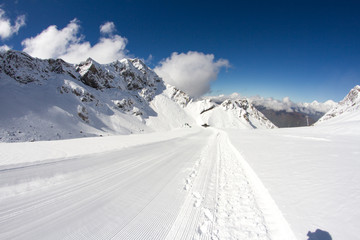 perfectly groomed empty ski piste