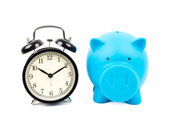 Alarm clock and piggy bank concept for saving time