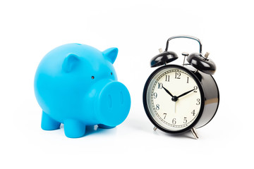 Alarm clock and piggy bank concept for saving time