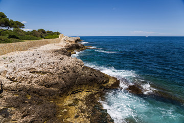 Fototapeta na wymiar Antibes, France. The rocky coast - 2