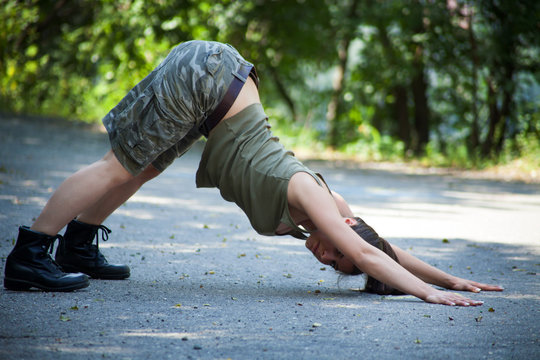 Beautiful Military Woman Training  In Park