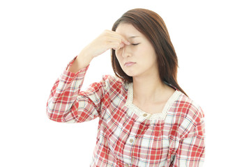頭痛を訴える女性
