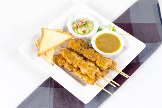 Chicken satay with bread