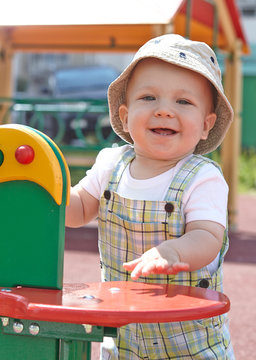 kid playing on playground