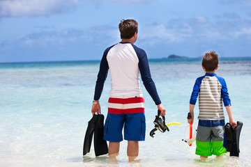 Fototapeta premium Father and son go snorkeling