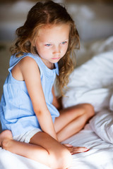 Sweet little girl in light blue pajama