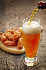 beer pouring into glass
