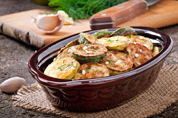 Fried zucchini in an old ceramic bowl