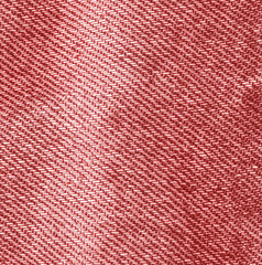 Fototapeta premium worn red denim fabric texture