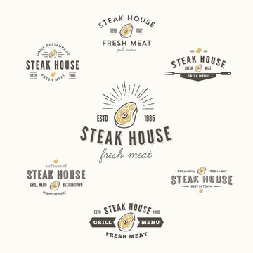 Collection of grill steak badges and logo parts