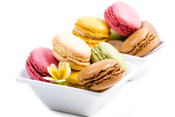 white bowl with colored macaroons