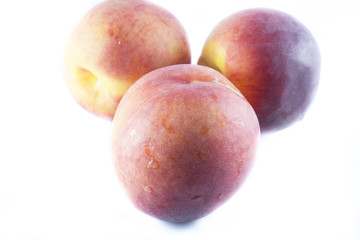peaches on white background