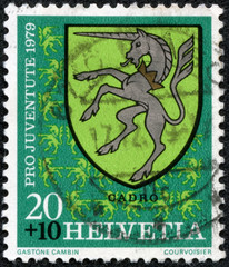 stamp printed by Switzerland, shows Cadro Arms