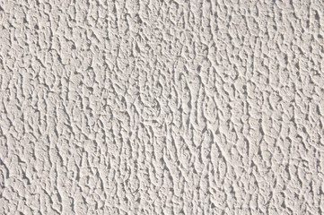 White rough plaster on wall closeup
