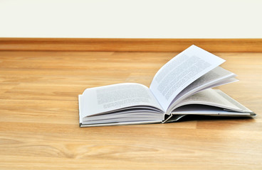 book onto room floor