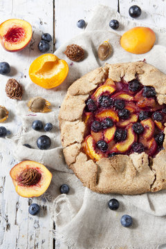 wholemeal french galette with blueberries peaches apricots