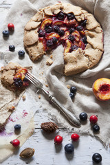 french galette with apricots peaches blueberries and rose hip
