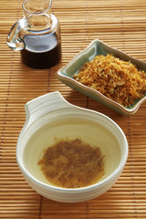 close up japanese soup from dry fish and vegetable in cup