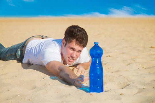 Young man crowling to water