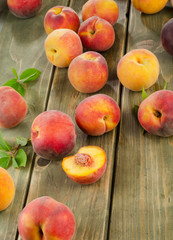 fresh peaches on a wooden table