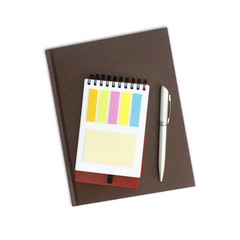 paper notes and pen on a white background