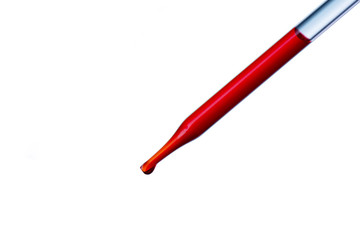 Red chemical drop into test tube