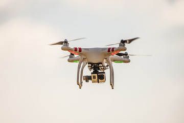 Flying drone in field 