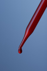 Red chemical drop into test tube