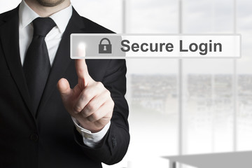 businessman pushing touschscreen secure login