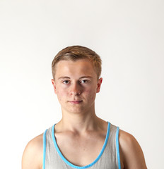 Portrait of a positive adolescent boy in puberty