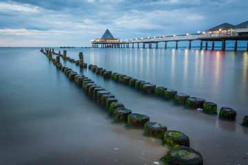 Wooden Breakwater during Sunset at the Coast of the Baltic Sea a