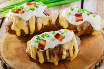 baked potato with cheese and sauce