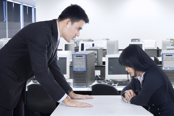 Businessman bullying his subordinate