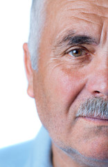 Lonely old man with gray hair and mustache