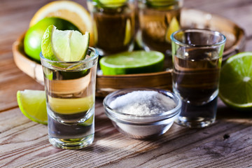 gold tequila with salt and lime