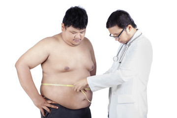 Doctor measuring a patient obesity 1