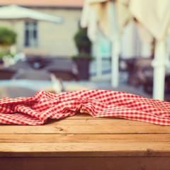 Table with cloth over restaurant blur background