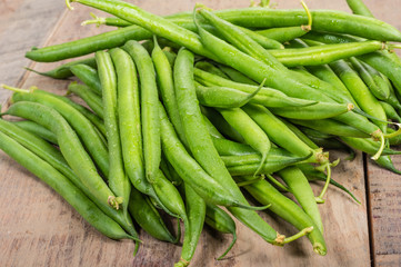 Fresh green beans on table